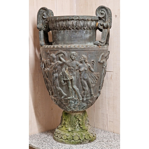 1021 - Impressive pair of grand tour lead twin handled urns, the scrolled handles with darted rim over a ba... 