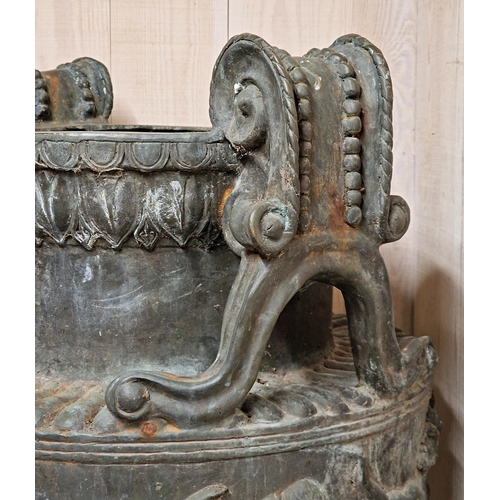 1021 - Impressive pair of grand tour lead twin handled urns, the scrolled handles with darted rim over a ba... 