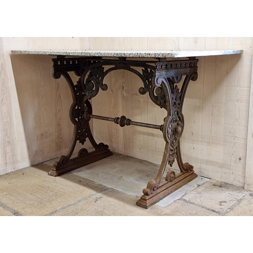 1022 - Good quality marble top table with exceptional cast iron base pierced with flowers and repeating bor... 