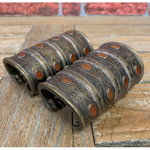 2160 - A good pair of 19th century Turkman silver and carnelian cuff bracelets L12cm, W7.5cm