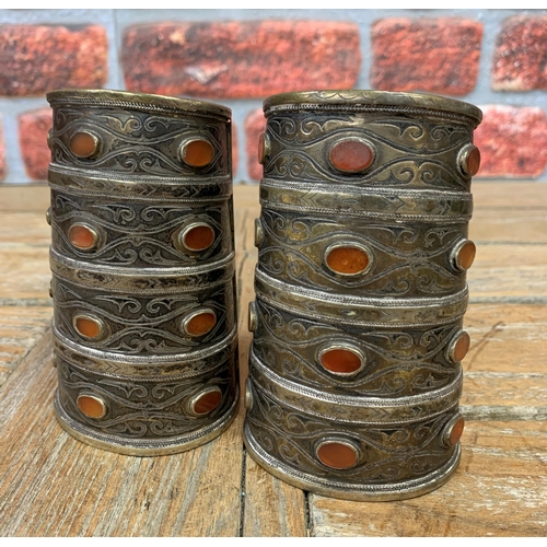 2160 - A good pair of 19th century Turkman silver and carnelian cuff bracelets L12cm, W7.5cm