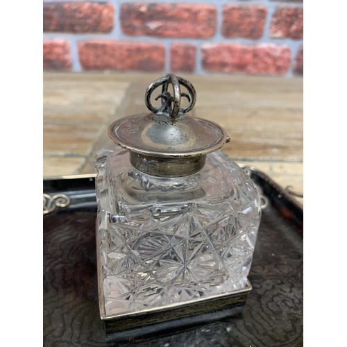 182 - A rather good Art Nouveau inkwell, on a tortoiseshell and silver stand with a silver topped glass we... 