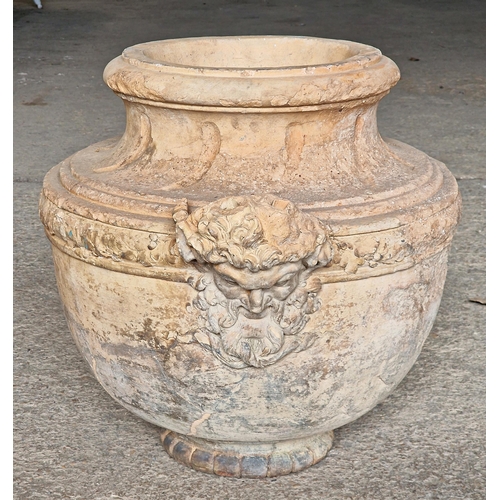 1293 - Early Etruscan clay urn with Bacchus head and vine detail, H 54cm