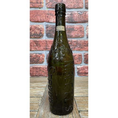 2494 - Large green 'Nibletts' Stroud cordial bottle, embossed leaf finish to neck, rare and sought after ex... 