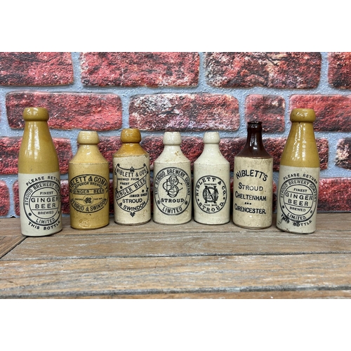 2495 - Collection of Stroud related stoneware ginger beer bottles, assortment of 'Niblett' and 'Stroud Brew... 