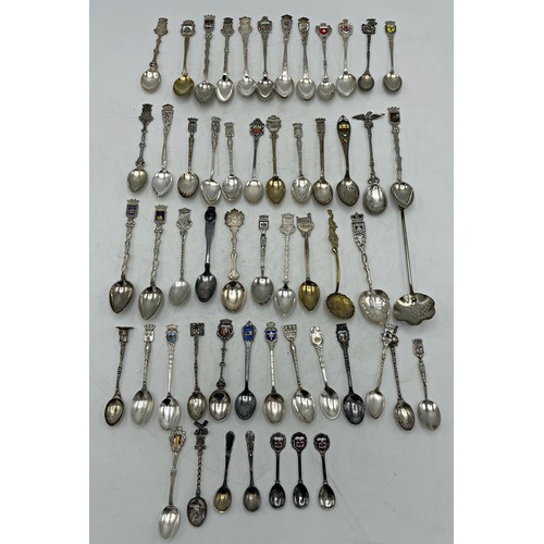 154 - Large assortment of mainly silver, white metal and plate continental souvenir spoons