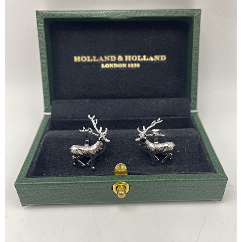 379 - Holland & Holland - boxed pair of stag cufflinks (as new)