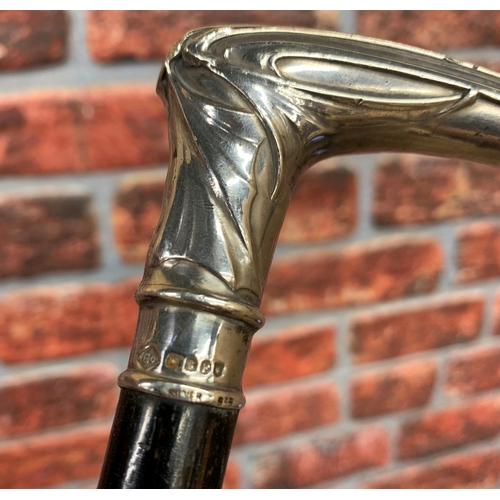 359 - Good quality Edwardian silver topped cane, with embossed Art Nouveau handle, 90cm long