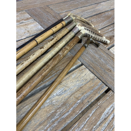 350 - Quantity of antique riding crops to include bone handled examples, largest L 75cm (6)