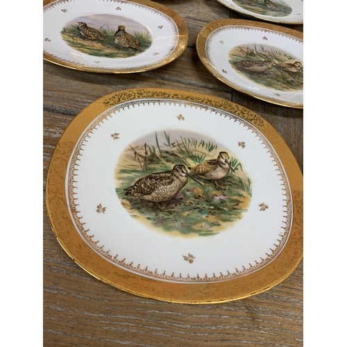 330 - Limoges hand painted game bird platter and plates with an impressive gold gilt scrolled floral borde... 