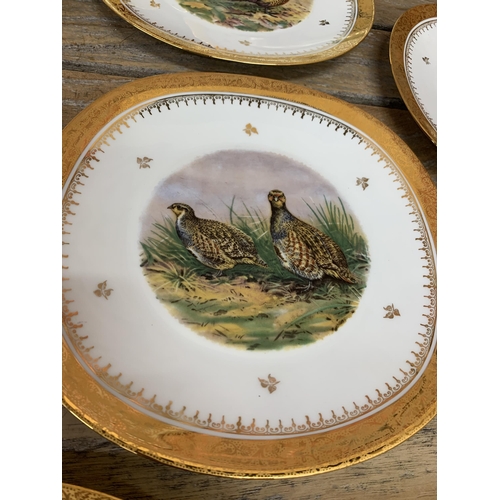 330 - Limoges hand painted game bird platter and plates with an impressive gold gilt scrolled floral borde... 