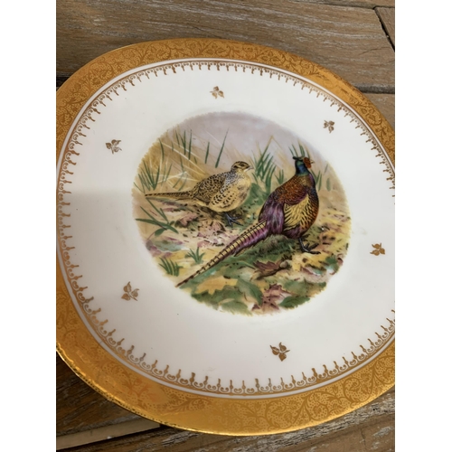 330 - Limoges hand painted game bird platter and plates with an impressive gold gilt scrolled floral borde... 