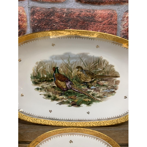 330 - Limoges hand painted game bird platter and plates with an impressive gold gilt scrolled floral borde... 