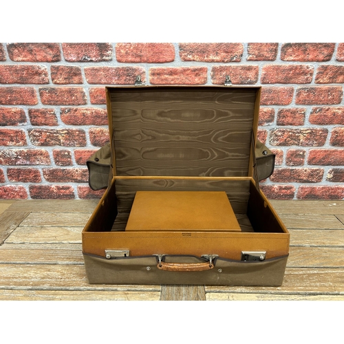 373 - Two Vintage leather cases, to include an Atlantic leather Gentleman's suitcase and grooming travel c... 