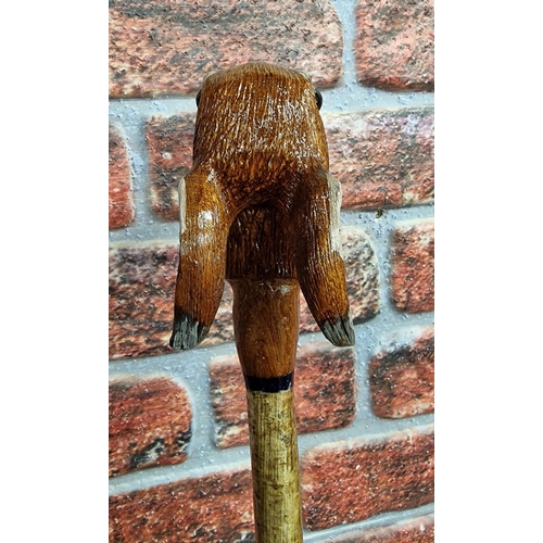 301 - Hand carved hares head walking stick, L 130cm