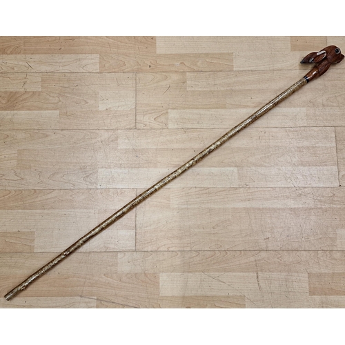 301 - Hand carved hares head walking stick, L 130cm