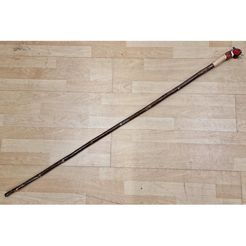 302 - Hand carved pheasants head walking stick, 140cm