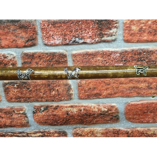 303 - Pair of hand carved hound head crook handle walking sticks, largest L 130cm (2)