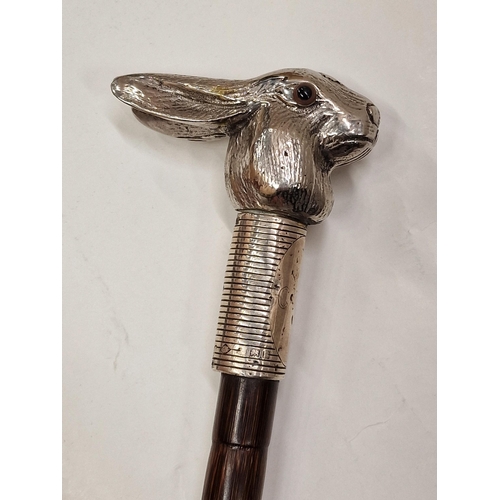 354 - Vintage chromed rabbit head and silver collared sword stick, having glass inset eyes and initialled ... 