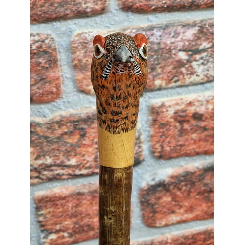 371 - Mark Richards Hand Carved Sportsman's Staff,  Walking Stick with Ashwood type shaft, the top carved ... 