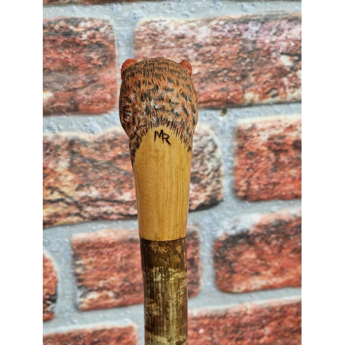 371 - Mark Richards Hand Carved Sportsman's Staff,  Walking Stick with Ashwood type shaft, the top carved ... 