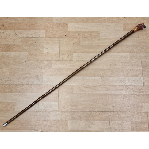 371 - Mark Richards Hand Carved Sportsman's Staff,  Walking Stick with Ashwood type shaft, the top carved ... 