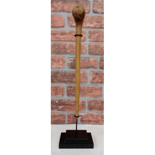 2135 - Vintage African Knobkerrie War club, displayed on heavy black Metal stand, H70cm