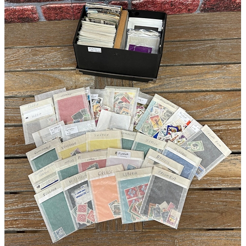 2556 - Mixed lot comprising two baskets of first day covers, ten Royal Mail Special Stamp albums (empty) an... 