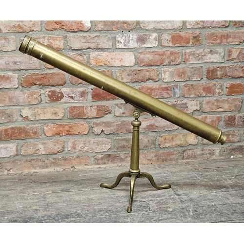 2256 - Late 19th century brass single draw table telescope raised on tripod base, L 100cm