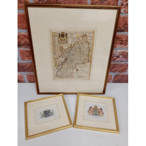 599 - Three prints to include a matching pair entitled 'A study in Heraldry' and a print of a 1671 map of ... 