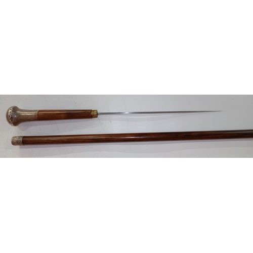 398 - A good quality Malacca cane sword stick, swagger stick, with Silver top, marked TD (Thomas Davis) Lo... 