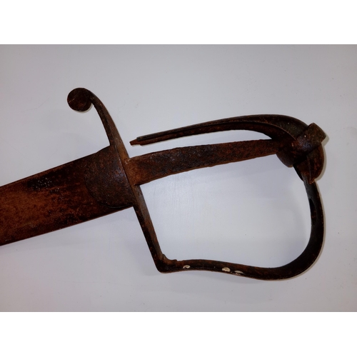 2470 - Late 18th early 19th century cavalry sword, curved fullered blade wider towards the tip, D shaped gu... 