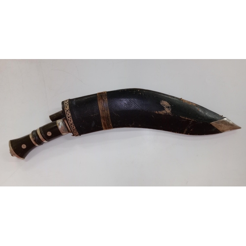 2462 - Two vintage Nepalese / Gurkha style kukri knife daggers. Typical form with bone and horn hilts, whit... 