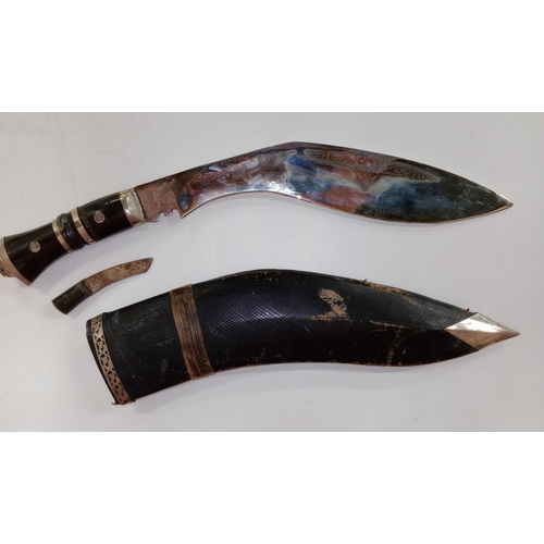 2462 - Two vintage Nepalese / Gurkha style kukri knife daggers. Typical form with bone and horn hilts, whit... 