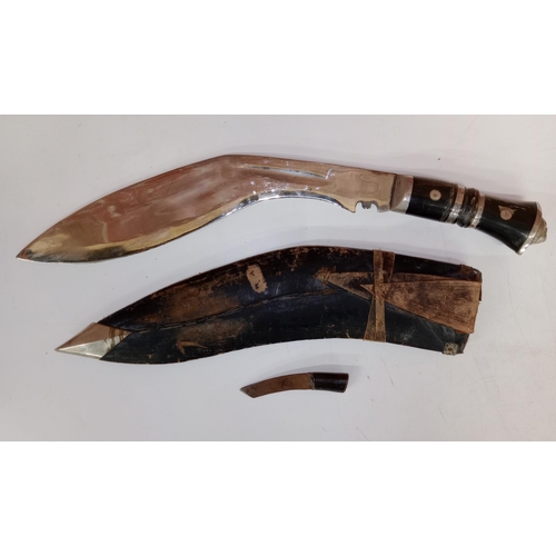 2462 - Two vintage Nepalese / Gurkha style kukri knife daggers. Typical form with bone and horn hilts, whit... 