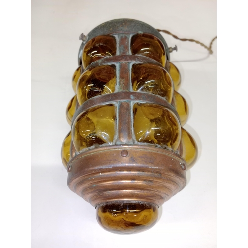 2393 - 1920/30s Copper and brown glass ships lantern, H26cm and another arts and crafts type lantern H35cm