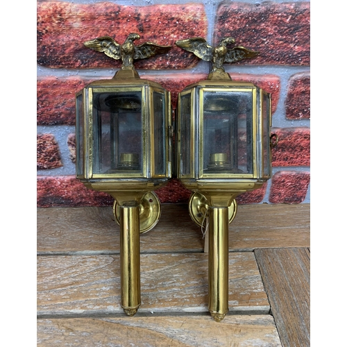 2374 - A Pair of Brass Carriage wall lights with Eagles, H40cm