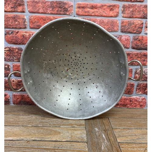 2254 - Vintage galvanized Colander, W48cm, and a large Cooper pan, W36cm.