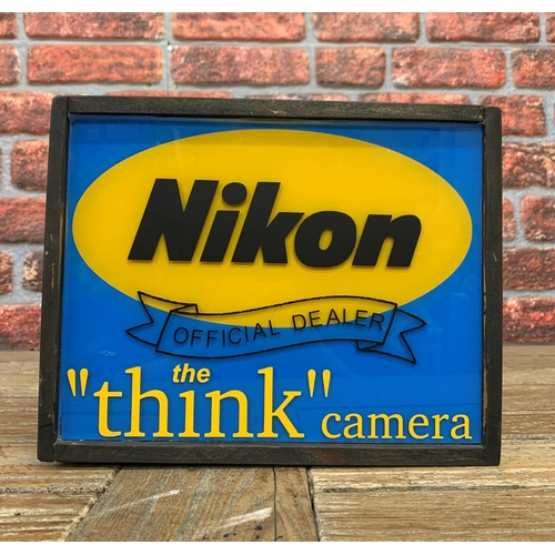 2512 - 'Nikon Official Dealer, the 