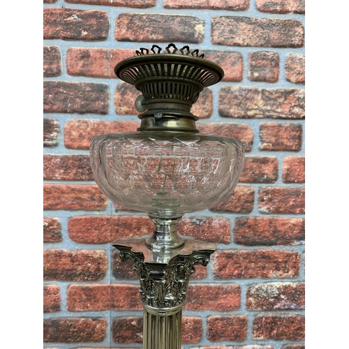 2394 - Table lamp formed from a Victorian Silver plated oil lamp of Corinthian column form, on a squared st... 