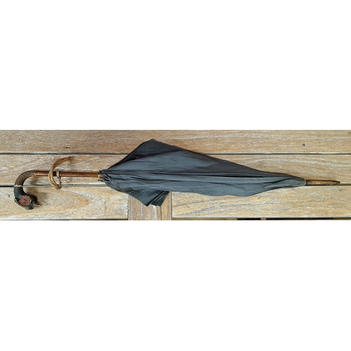 390 - Antique Brigg & Sons, London, umbrella with carved handle in the shape of a pheasant L92cm