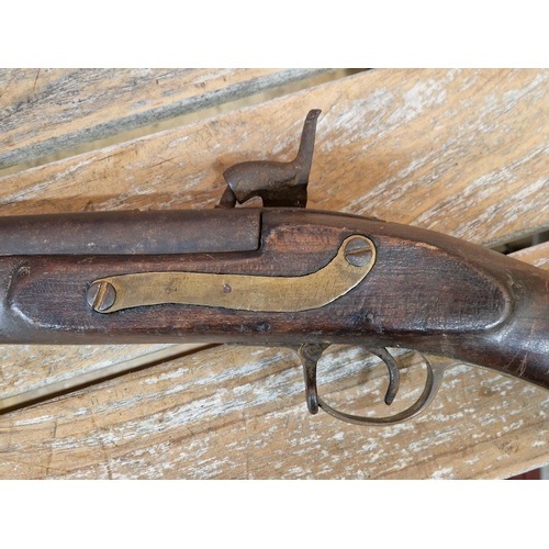 2469 - An Indian muzzle loading rifle, built to copy an Enfield, with blued steel barrel, blued barrel band... 