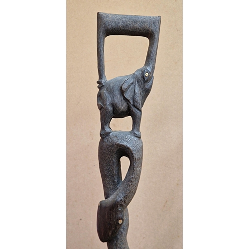 2132 - Vintage African Hand carved Ebony Staff the main trunk being snake shaped with an Elephant at the to... 