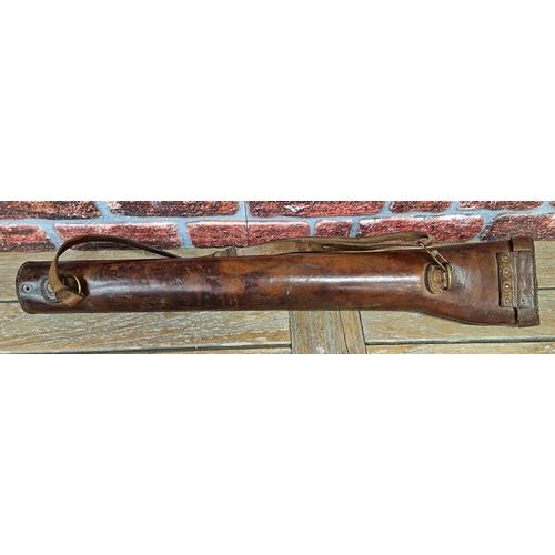 2461 - WW1 Leather and copper Shotgun case, with a collection of 3 piece barrel cleaning rods. (4)