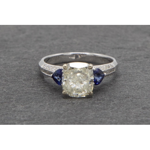 87 - Exceptional 18ct White Gold Cushion Cut Diamond Ring, the central stone approx 2.5cts, approx 8.36 x... 