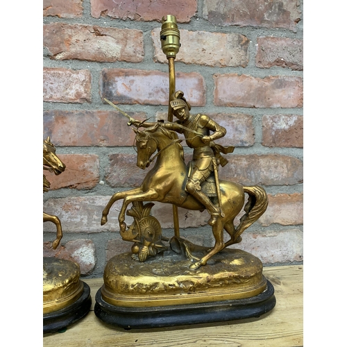 2402 - Pair of gilt spelter table lamps depicting Vercingetorix triumphant at the battle of Gergovia, mount... 