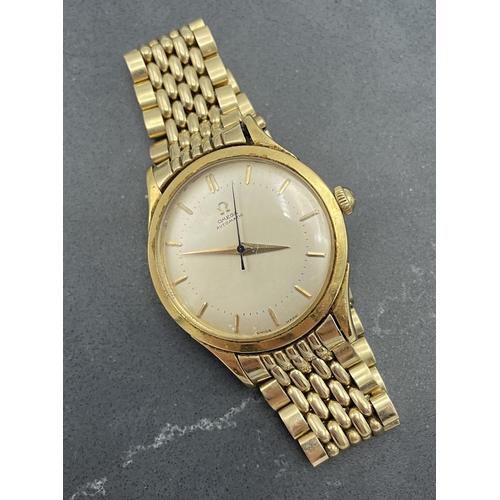 10 - Vintage gents 14ct Omega Automatic watch, 36mm case, champagne dial with gilt hands and markers, on ... 