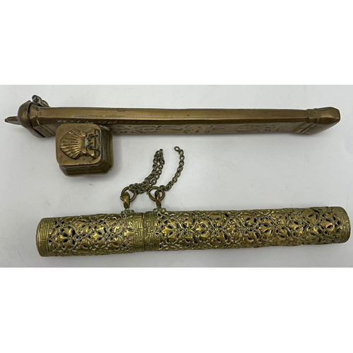 2154 - Antique Ottoman brass scribes travelling inkwell, 24cm long, with a further Tibetan brass needle or ... 