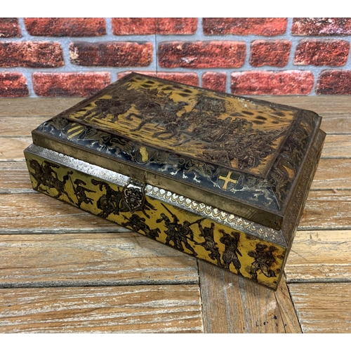 2513 - Antique Victoria large biscuit tin, decorated in relief with a medieval battle scene, 18 x 42cm