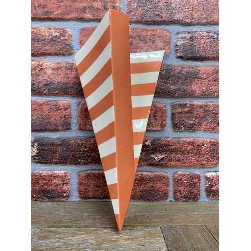 2074 - Unusual orange and white banded 'impossible triangle' ceramic wall pocket, signed to reverse, H 35cm